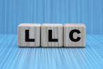 Wooden Blocks with the Letters L L C